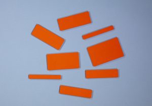 A set of orange width bars of varying size on a blue background.