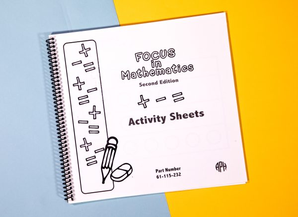 FOCUS in Math spiral-bound activity sheets workbook sitting on a yellow and blue background.