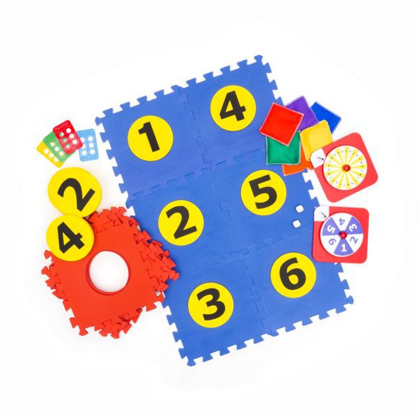 All the pieces of the Hop-a-Dot kit arranged on a white background. In the center are six interlocking foam squares with yellow numbered circles inserted to resemble a braille cell.