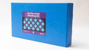 The blue storage box for Tactile Ionic Bonding Kit Nemeth. The sticker with the product name resembles the design on the front cover of the guidebook.