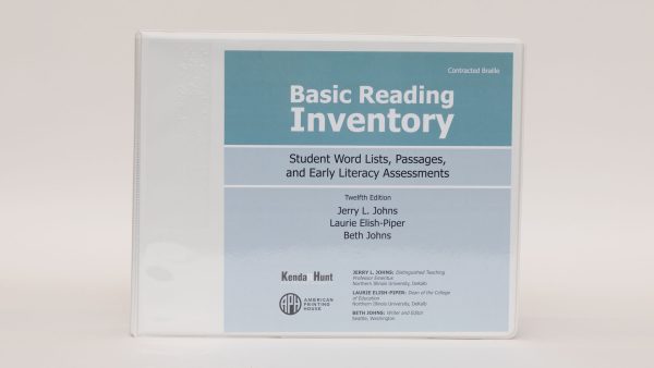 A three-ring Basic Reading Inventory binder labeled "Contracted Braille" standing on a white background. The blue cover says, "Basic Reading Inventory - Student Word Lists, Passages, and Early Literacy Assessments" and list the authors.