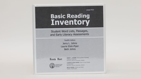 A three-ring Basic Reading Inventory binder labeled "Large Print" standing on a white background. The black and gray cover says, "Basic Reading Inventory - Student Word Lists, Passages, and Early Literacy Assessments" and list the authors.